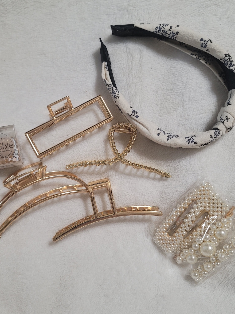 New hair accessories 
Pearl hair clips
Gold claw clips
Invisibobble hair ties